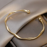 Pulseira Vivence Torcida Banhada a Ouro 18k